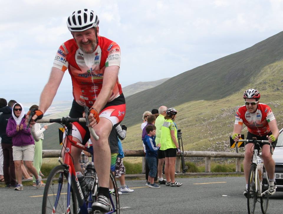 Eoin O Leary smiles at the top of Conors Pass---when does the climb kick up